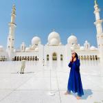 Sweating profusely in the sweltering heat. FYI, abaya's are hot! 