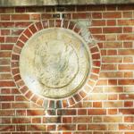 The seal of the United States on the embassy wall now defaced.