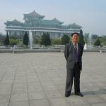 Mr. Kim (one of my North Korean guides) in front of the Grand People's Study House.