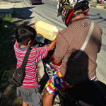 Getting fuel. They start them young in West Papua!