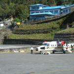 Lukla Airport.  Land and stop asap or hit the mountainside. 